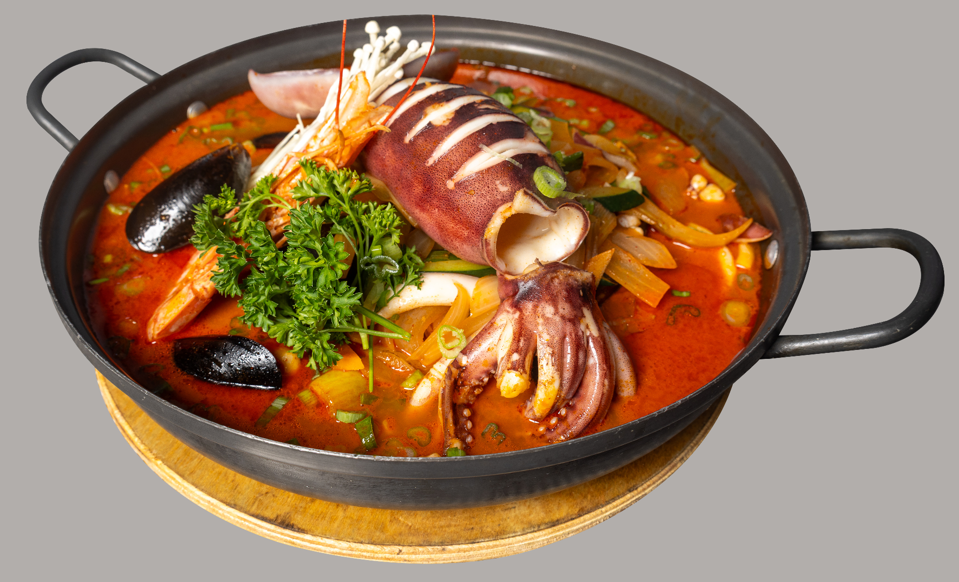 Spicy seafood stew with lobster and squid